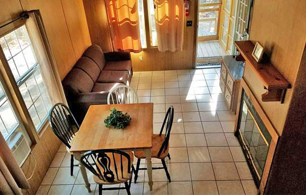 lodge cabins rental interior from loft above